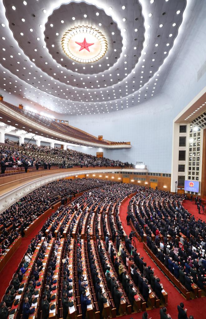 3月11日，第十四屆全國人民代表大會第二次會議在北京人民大會堂舉行閉幕會。新華社記者 丁林 攝